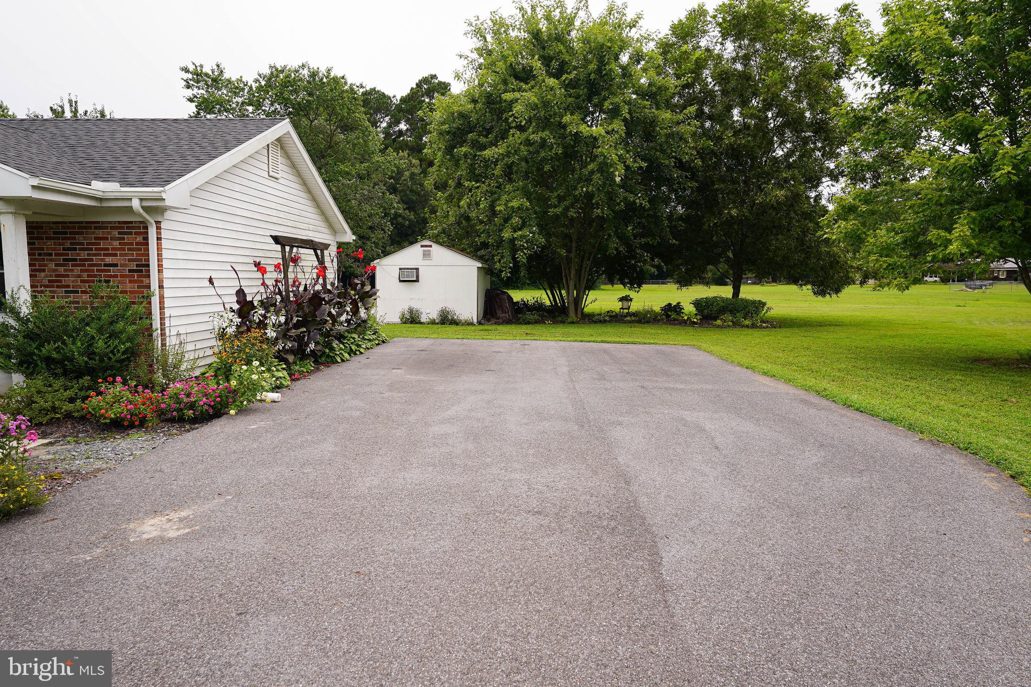 7209 Opal Circle Hebron, MD 21830 - Photo 11 of 41 a front view of house with yard and green space