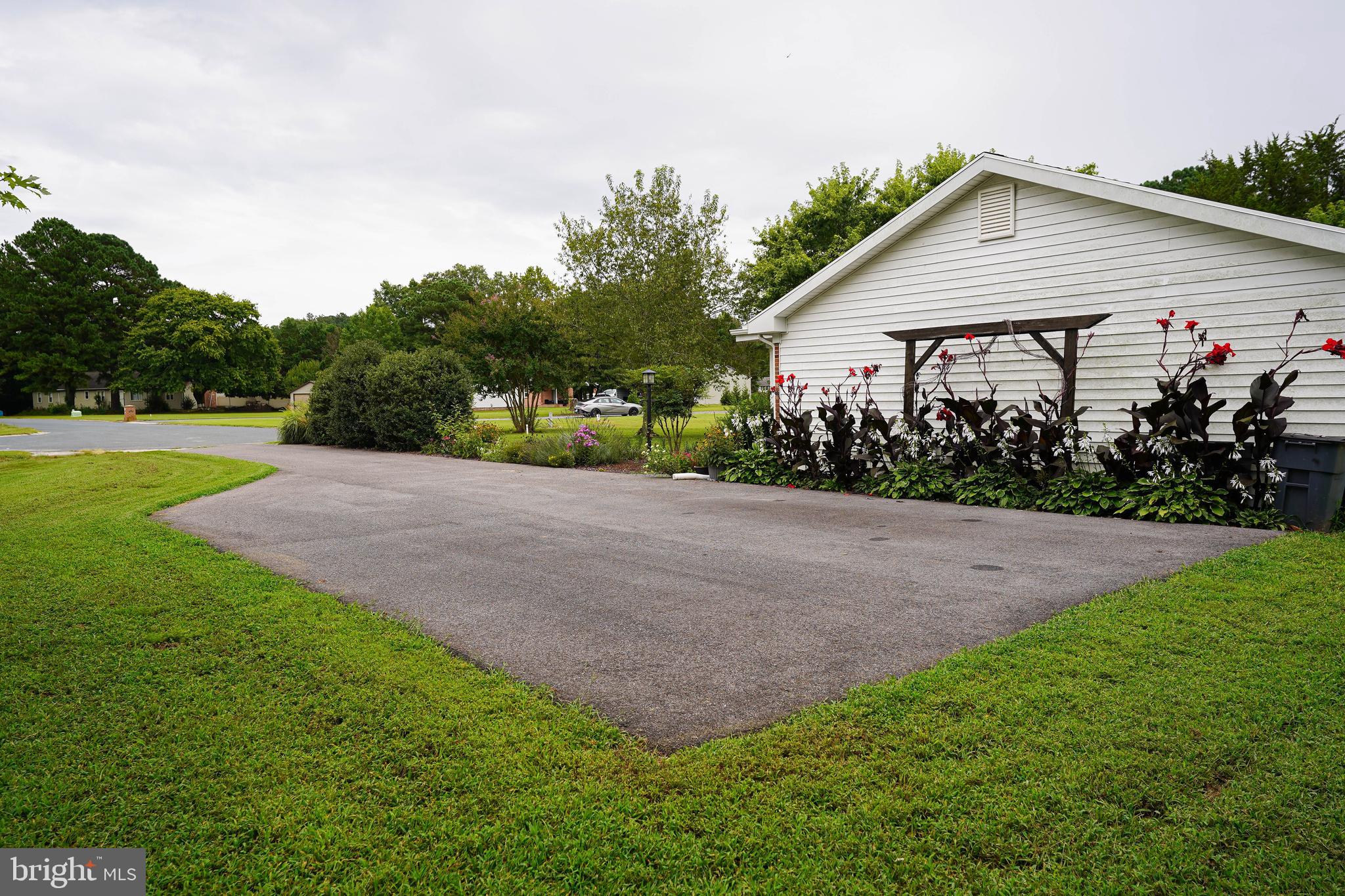 7209 Opal Circle Hebron, MD 21830 - Photo 12 of 41 a view of a house with backyard and garden
