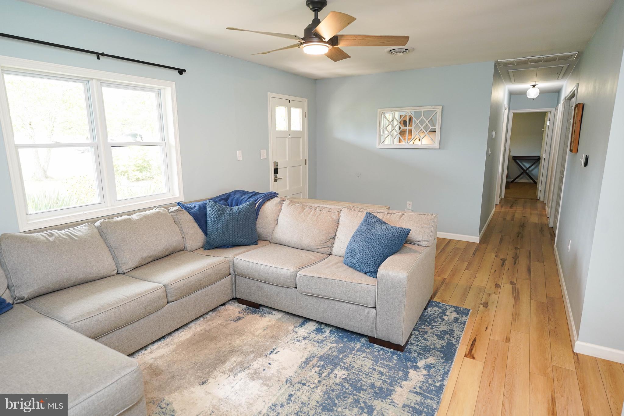 7209 Opal Circle Hebron, MD 21830 - Photo 15 of 41 a living room with furniture and a window