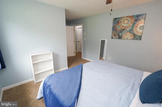 a view of an entryway with a hallway