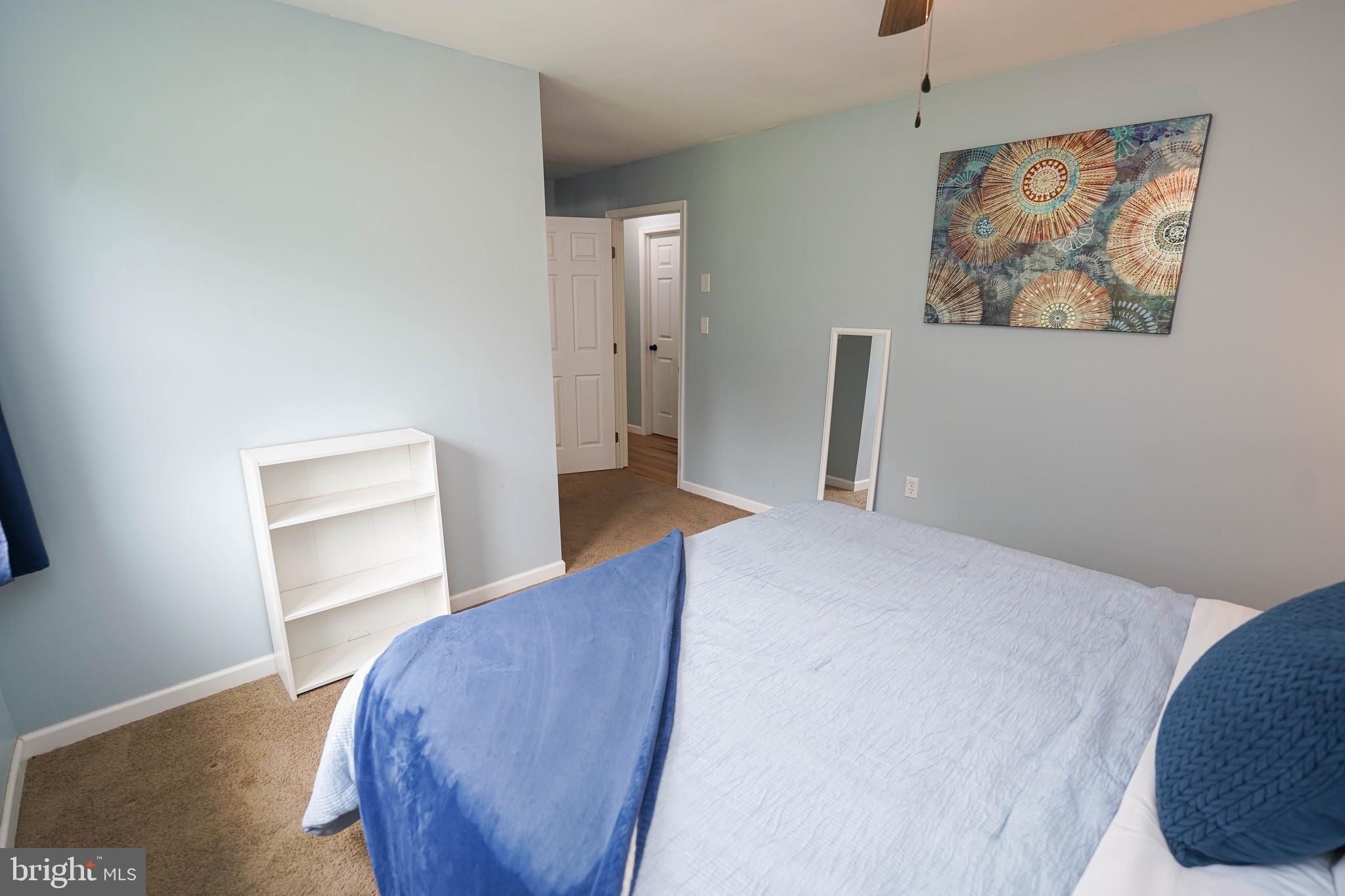 7209 Opal Circle Hebron, MD 21830 - Photo 28 of 41 a view of a bedroom with wooden floor and closet
