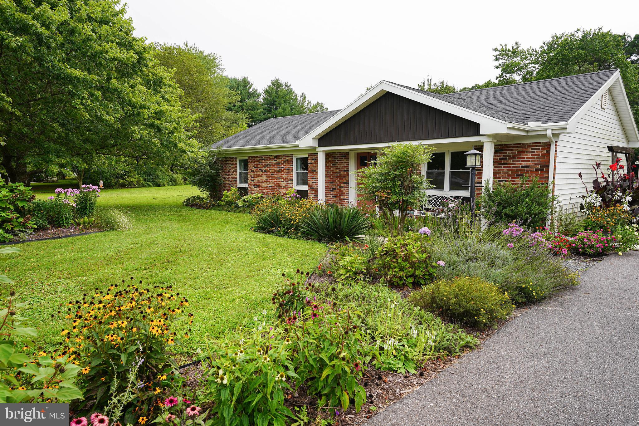 7209 Opal Circle Hebron, MD 21830 - Photo 4 of 41 a view of a house with garden