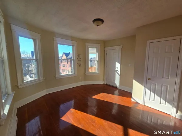 a view of an empty room and window