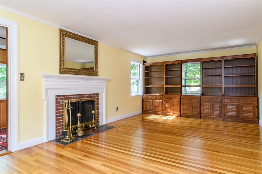 115 Parker Road Wellesley, MA 02482 - Photo 5 of 22 a living room with furniture and a fireplace