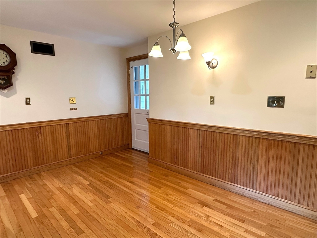115 Parker Road Wellesley, MA 02482 - Photo 9 of 22 a view of a livingroom with wooden floor