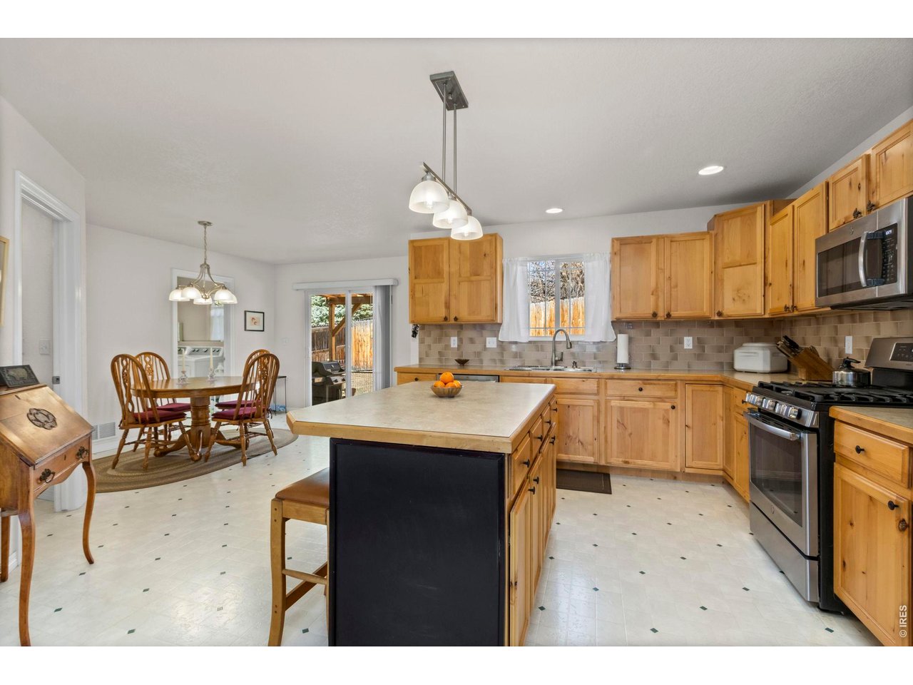 2868 Pleasant Valley Road Fort Collins, CO 80521 - Photo 12 of 30 Large, open kitchen with eat-in area and island