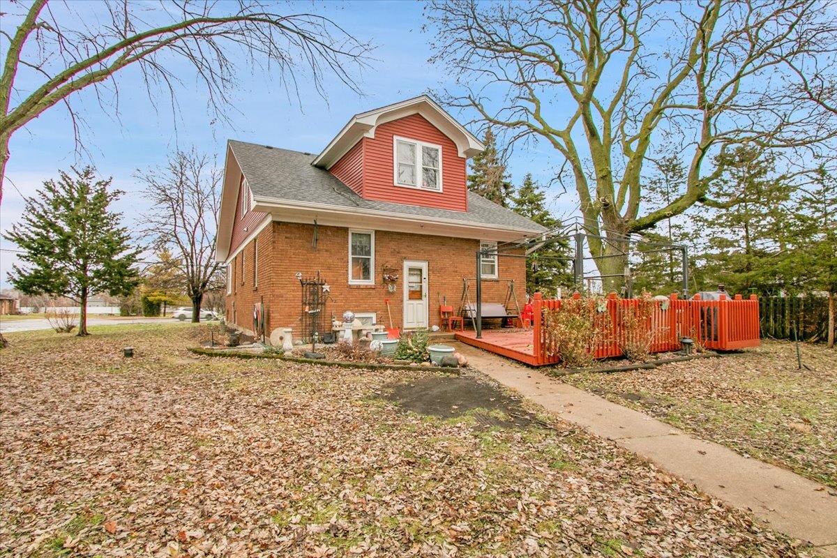 24447 Caton Farm Road Plainfield, IL 60586 - Photo 22 of 27 a view of a house with a yard covered in snow