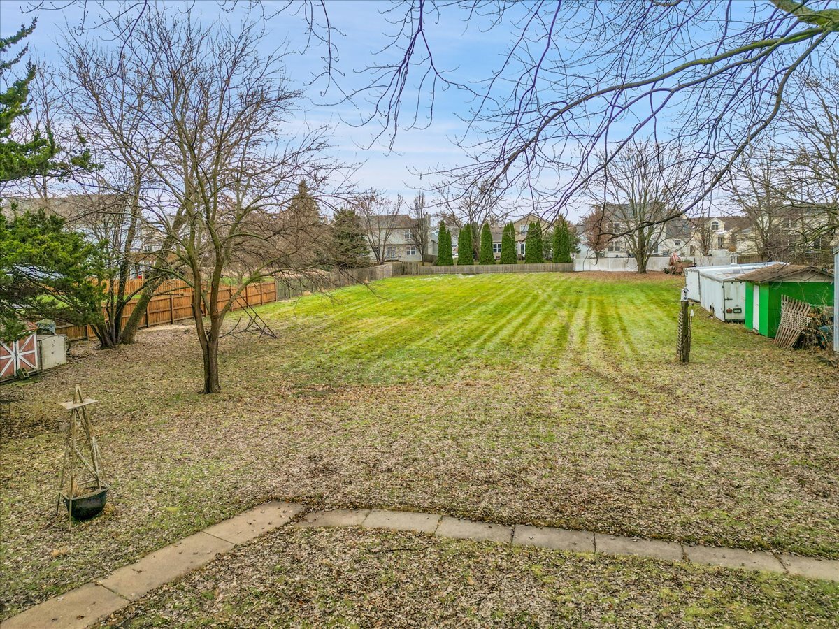 24447 Caton Farm Road Plainfield, IL 60586 - Photo 26 of 27 a view of yard with swimming pool