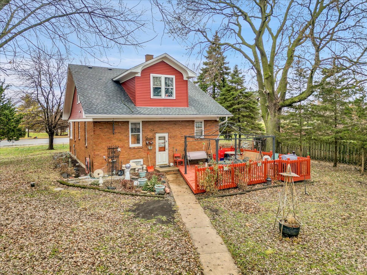 24447 Caton Farm Road Plainfield, IL 60586 - Photo 8 of 27 a view of a house with backyard porch and sitting area