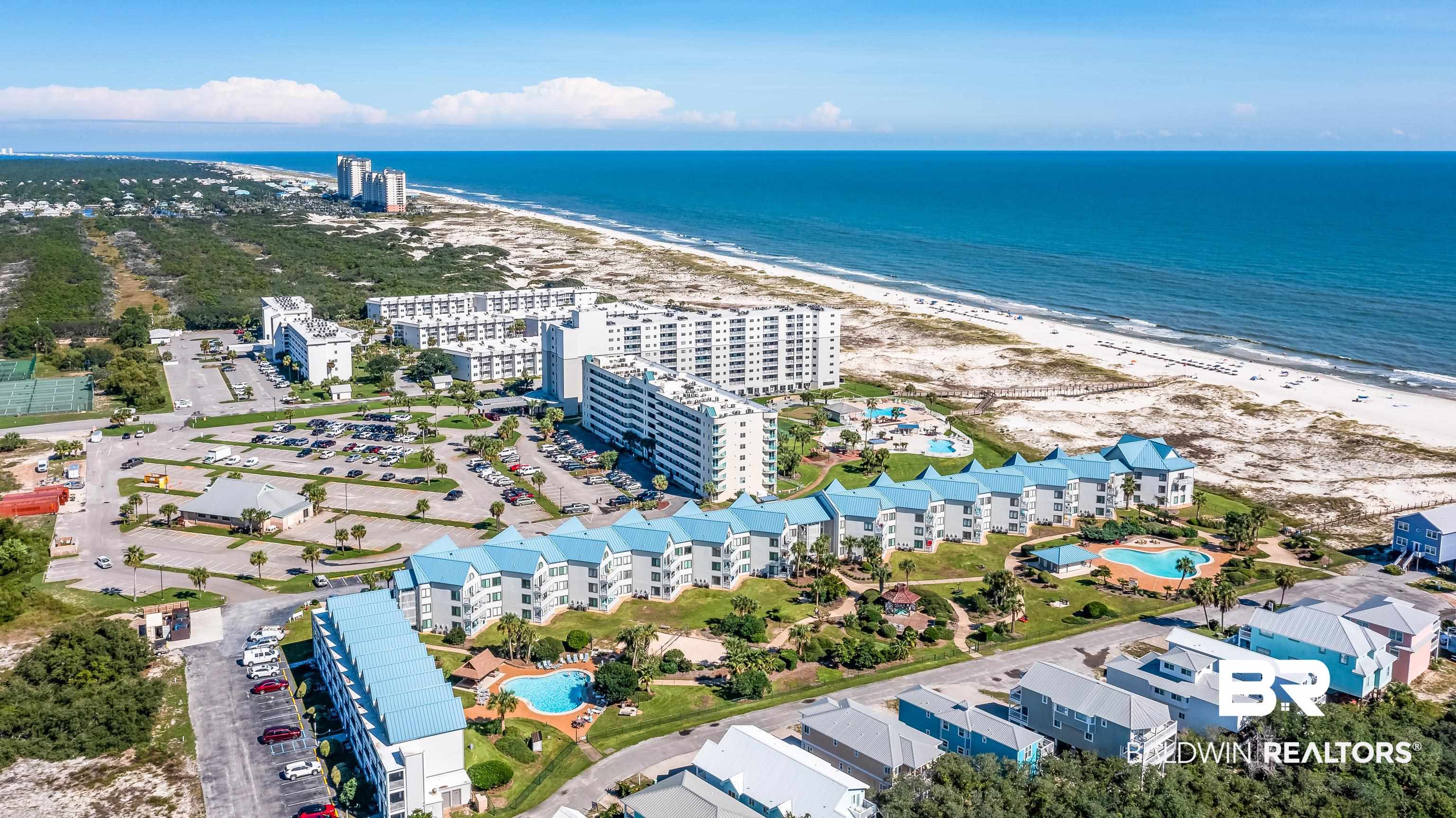 497 Plantation Road, Unit 1143 Gulf Shores, AL 36542 - Photo 48 of 50 Drone / aerial view with a view of the beach and a water view
