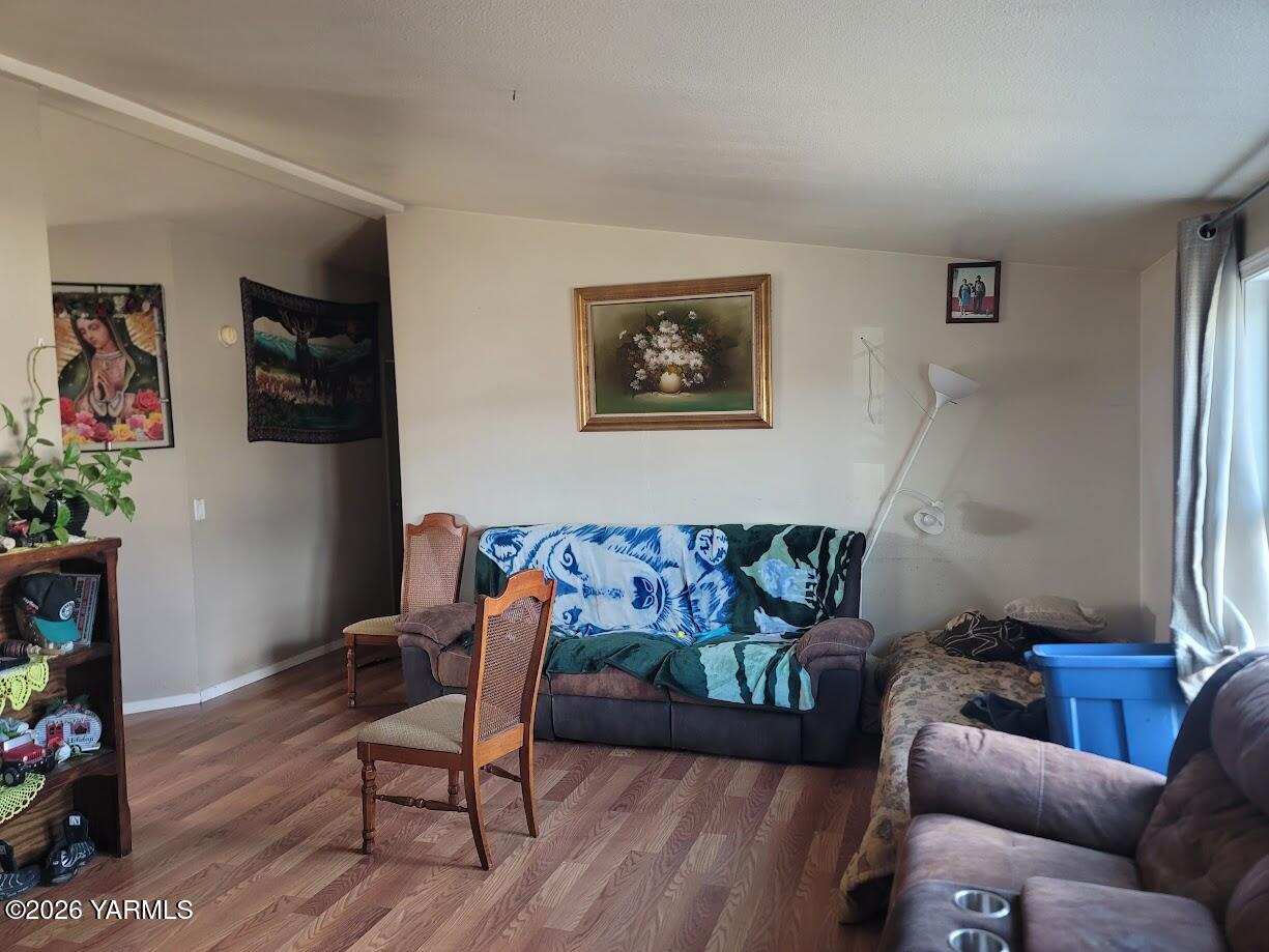 101 West Elizabeth Street Wapato, WA 98951 - Photo 5 of 7 a living room with furniture and a flat screen tv