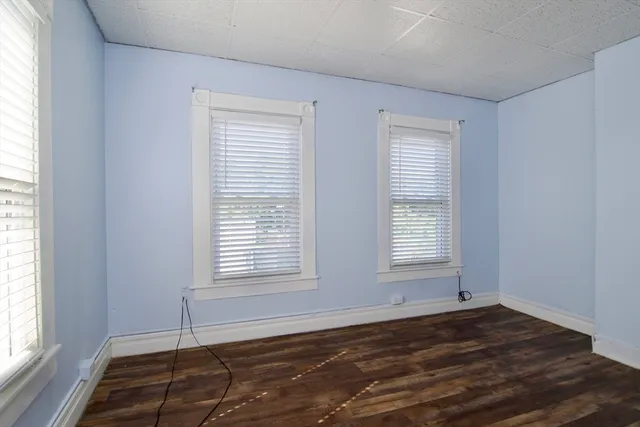 an empty room with a bed