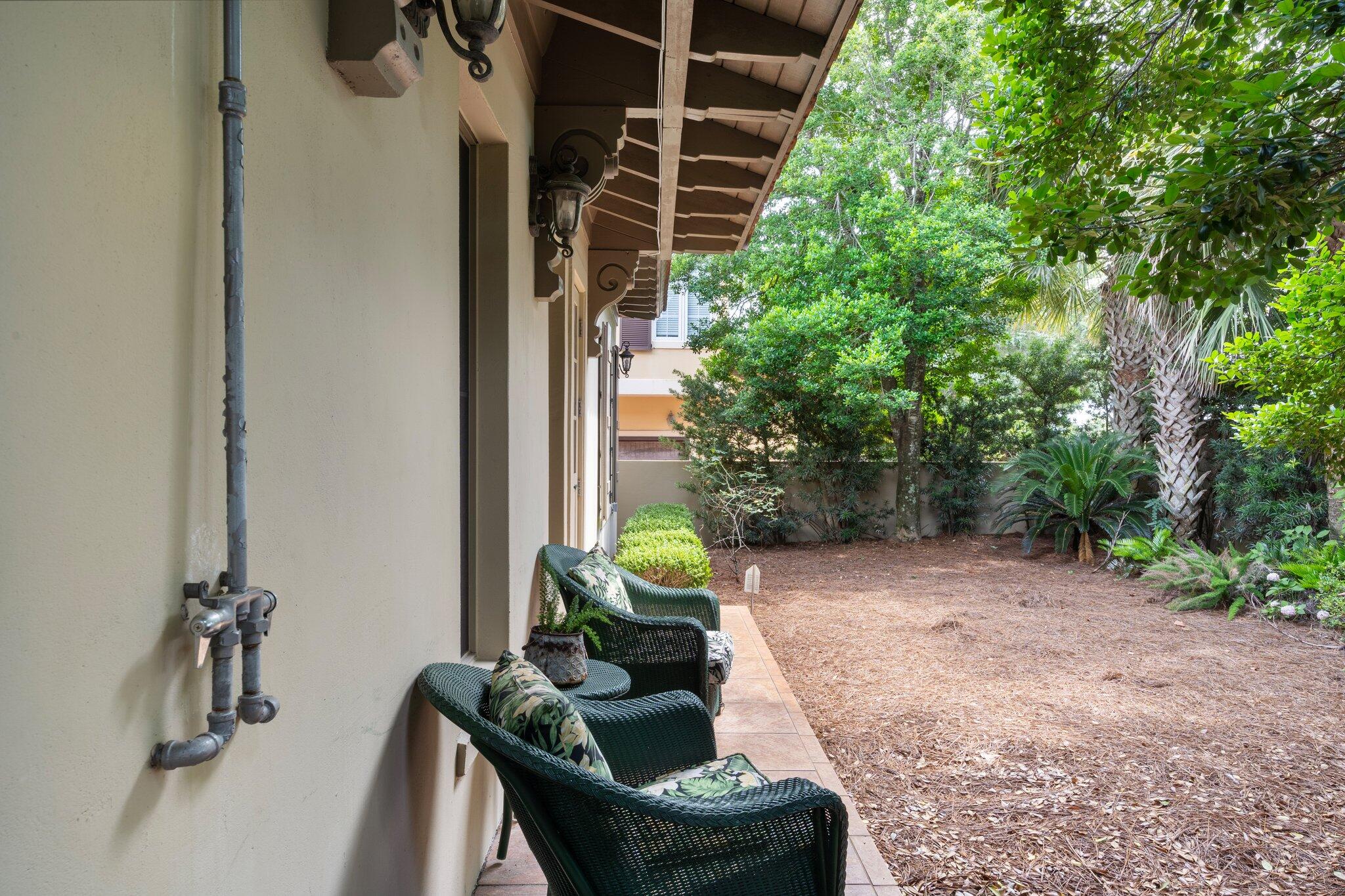 176 Rue Martine Miramar Beach, FL 32550 - Photo 50 of 82 a backyard of a house with seating space