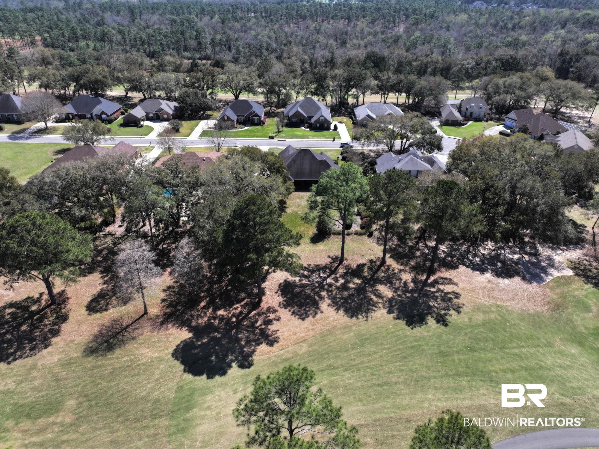 306 South Tee Drive Fairhope, AL 36532 - Photo 29 of 37 Birds eye view of property featuring a residential view and a wooded view