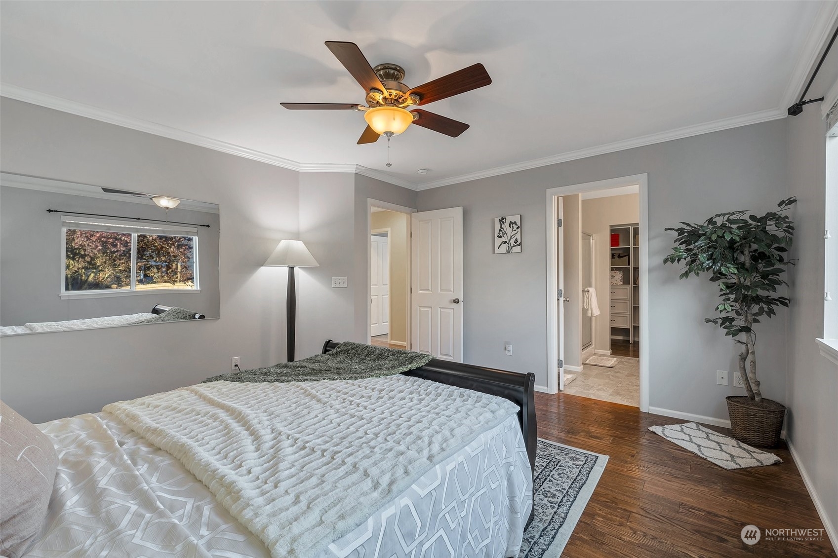 16603 42nd Avenue Southeast Bothell, WA 98012 - Photo 17 of 35 a bedroom with a bed and a potted plant