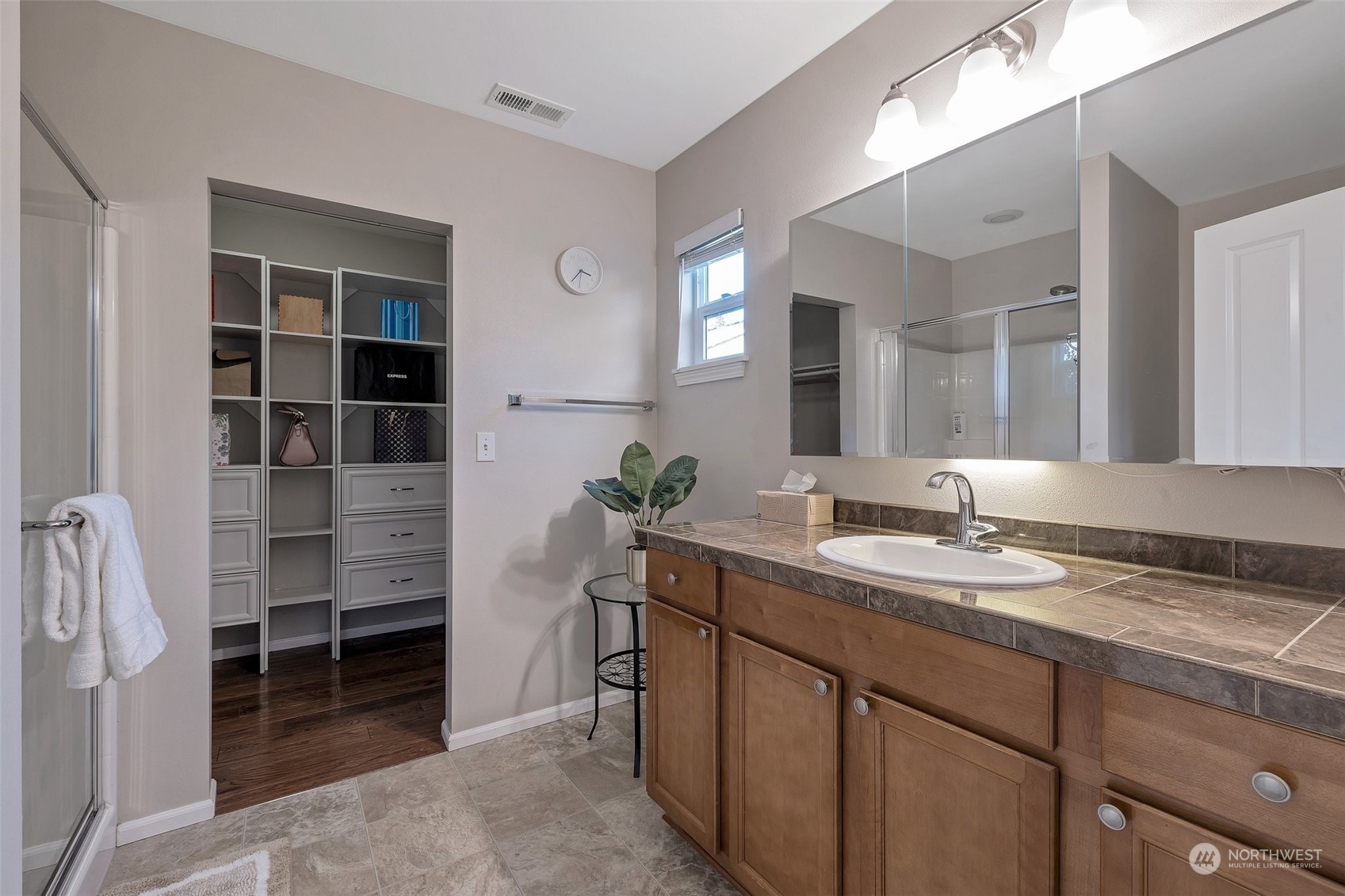 16603 42nd Avenue Southeast Bothell, WA 98012 - Photo 18 of 35 a bathroom with a sink and a mirror
