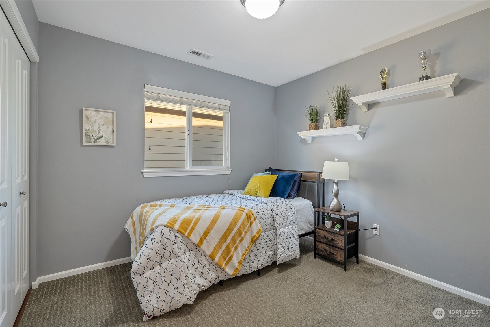 16603 42nd Avenue Southeast Bothell, WA 98012 - Photo 19 of 35 a bedroom with bed and a window