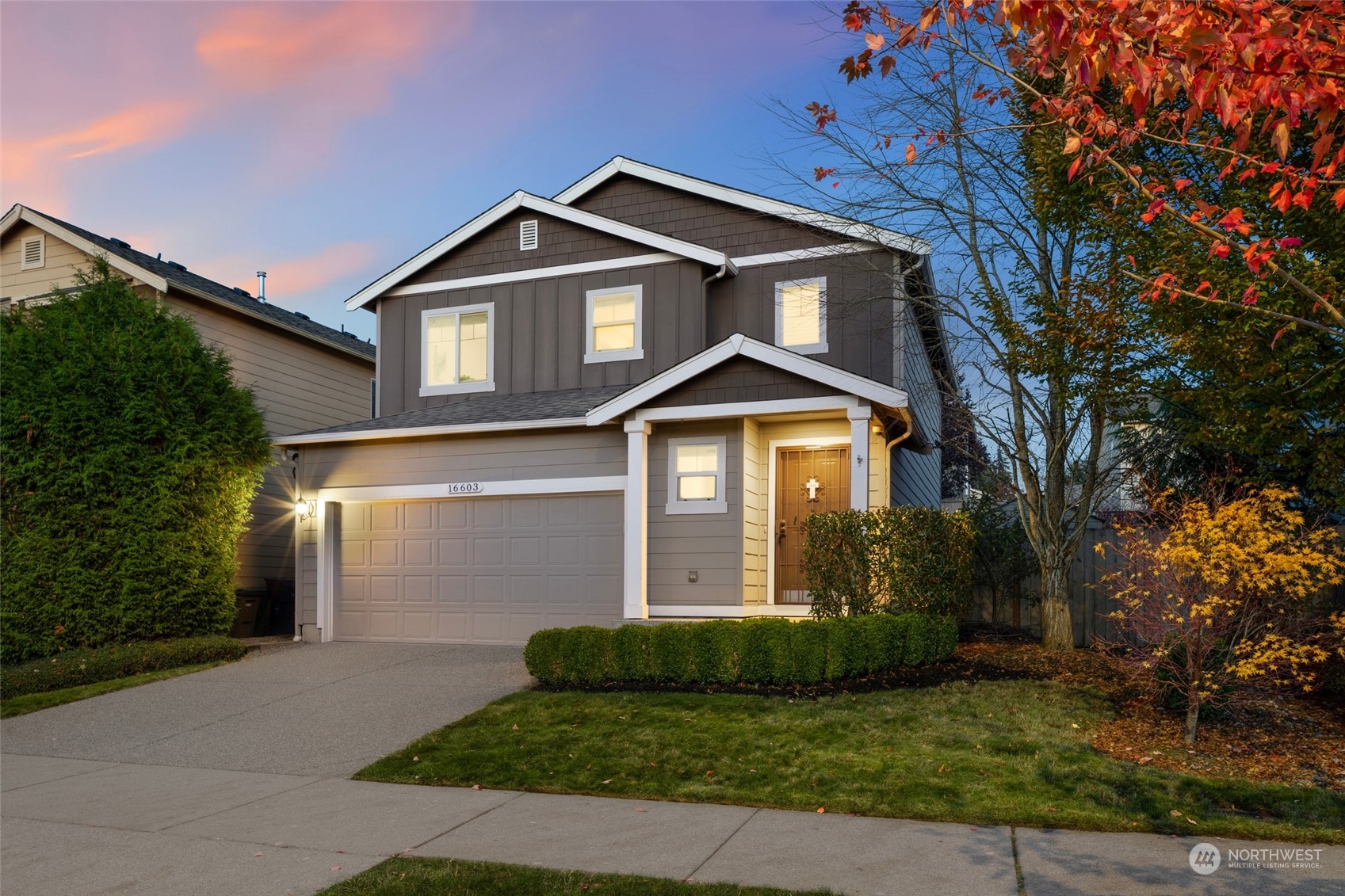 16603 42nd Avenue Southeast Bothell, WA 98012 - Photo 2 of 35 a front view of a house with a yard