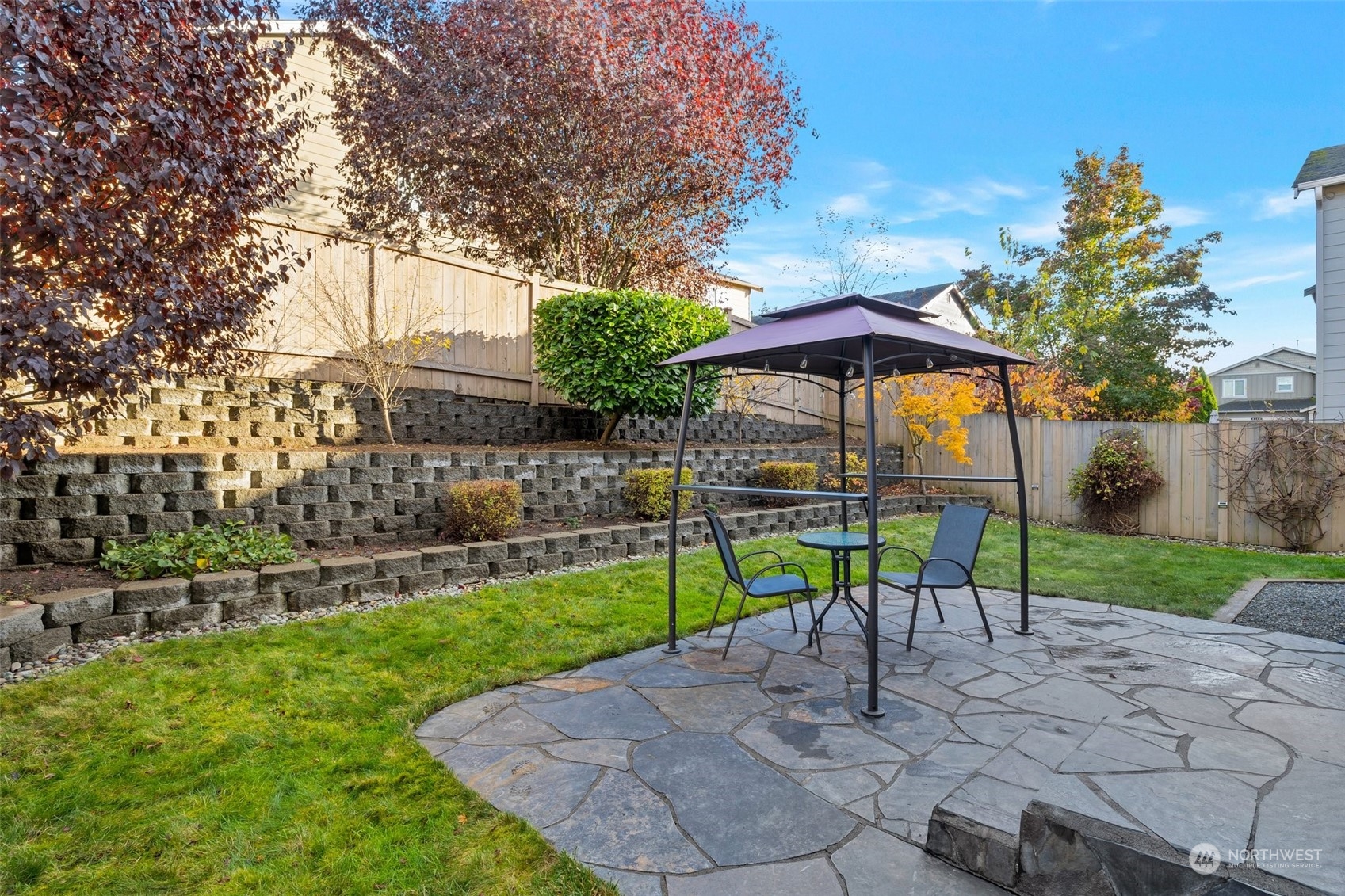 16603 42nd Avenue Southeast Bothell, WA 98012 - Photo 23 of 35 a view of a bench in a backyard