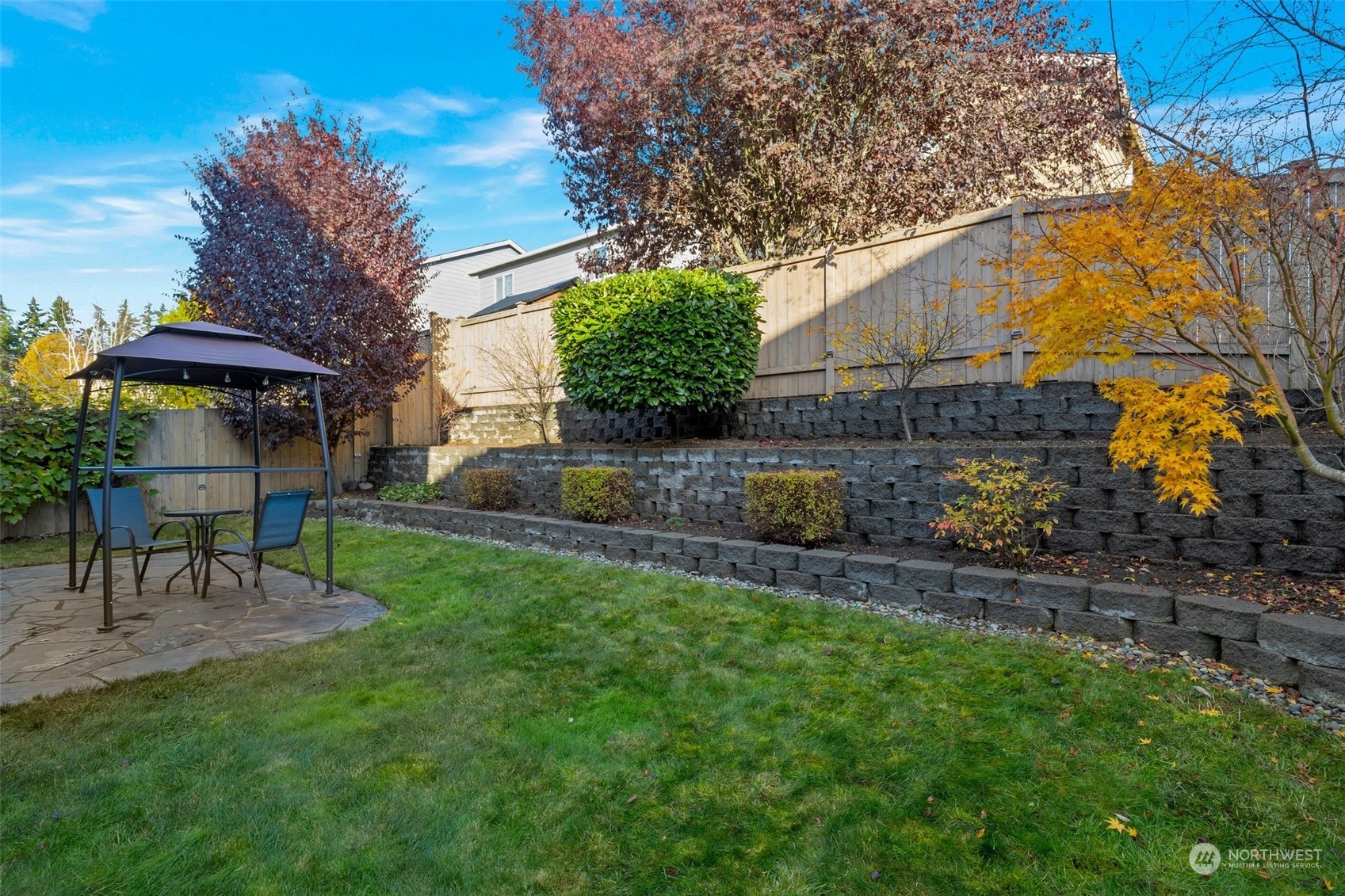16603 42nd Avenue Southeast Bothell, WA 98012 - Photo 25 of 35 a view of a table and chairs under an umbrella
