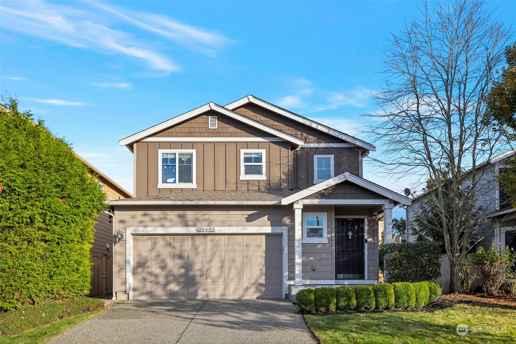 16603 42nd Avenue Southeast Bothell, WA 98012 - Photo 3 of 35 a front view of a house with garden