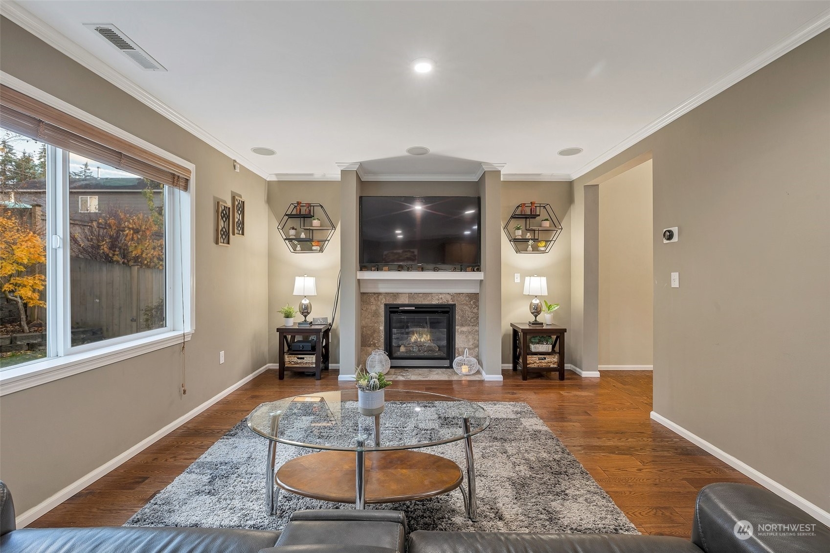 16603 42nd Avenue Southeast Bothell, WA 98012 - Photo 9 of 35 a living room with furniture and a fireplace