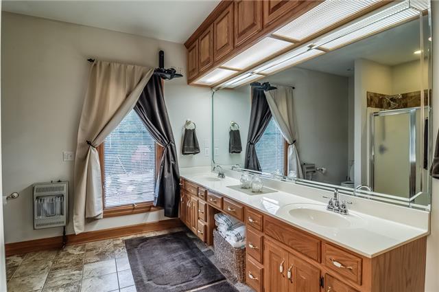 5400 Betts Road Greenbrier, TN 37073 - Photo 15 of 20 A bath to spoil you: whirlpool tub, shower, double vanities, walk-in closet with dressing area..