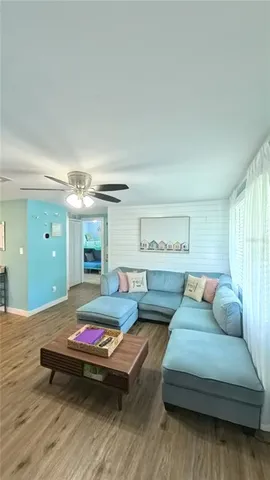 a living room with furniture and a table