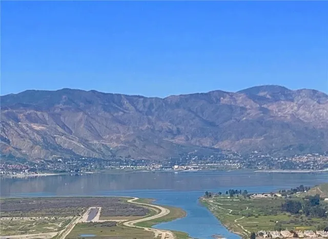 a view of a lake with mountains in the background