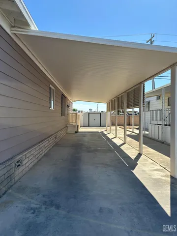 a view of a house with a street