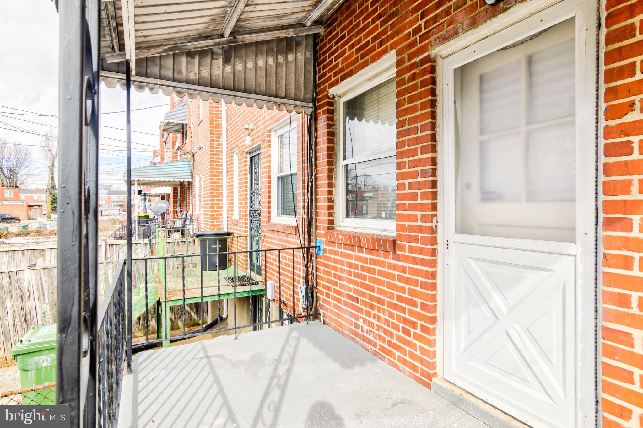 6924 Glenheights Road Baltimore, MD 21215 - Photo 15 of 16 Back porch perfect for grilling