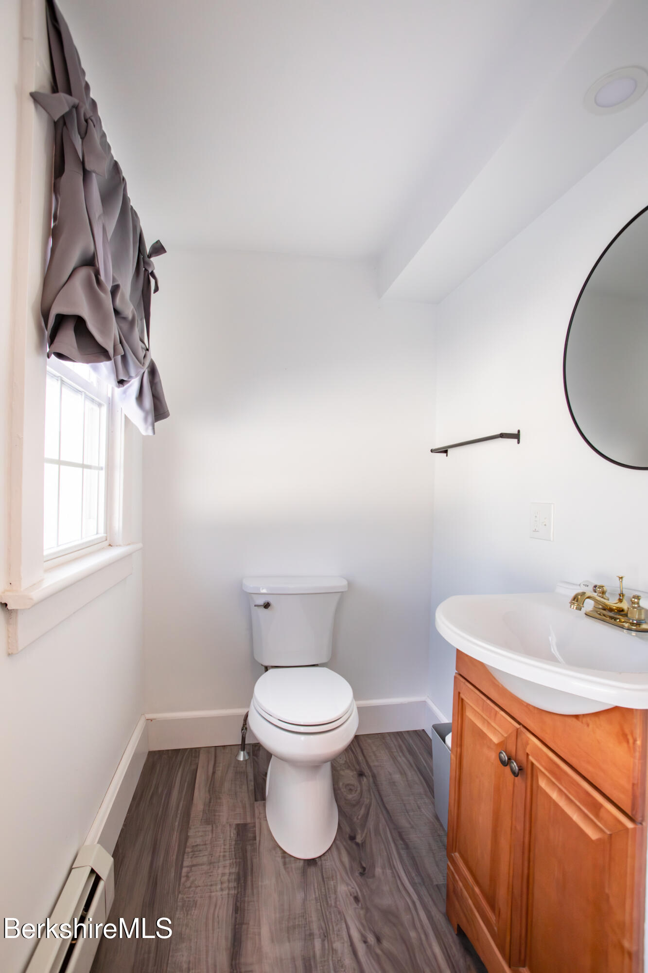 35 Chapman Road Pittsfield, MA 01201 - Photo 16 of 43 a bathroom with a toilet and a sink