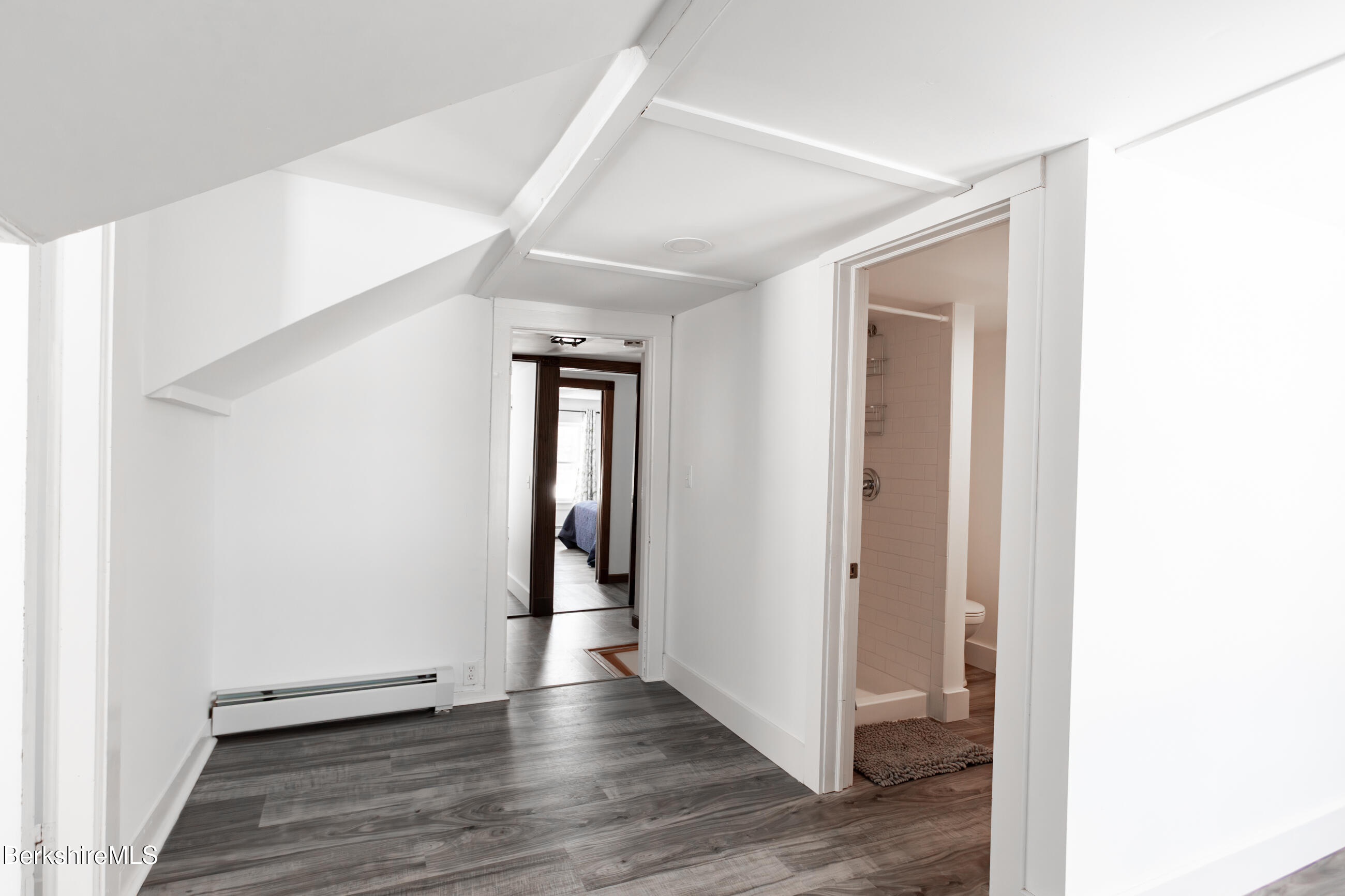 35 Chapman Road Pittsfield, MA 01201 - Photo 20 of 43 a view of a hallway with wooden floor