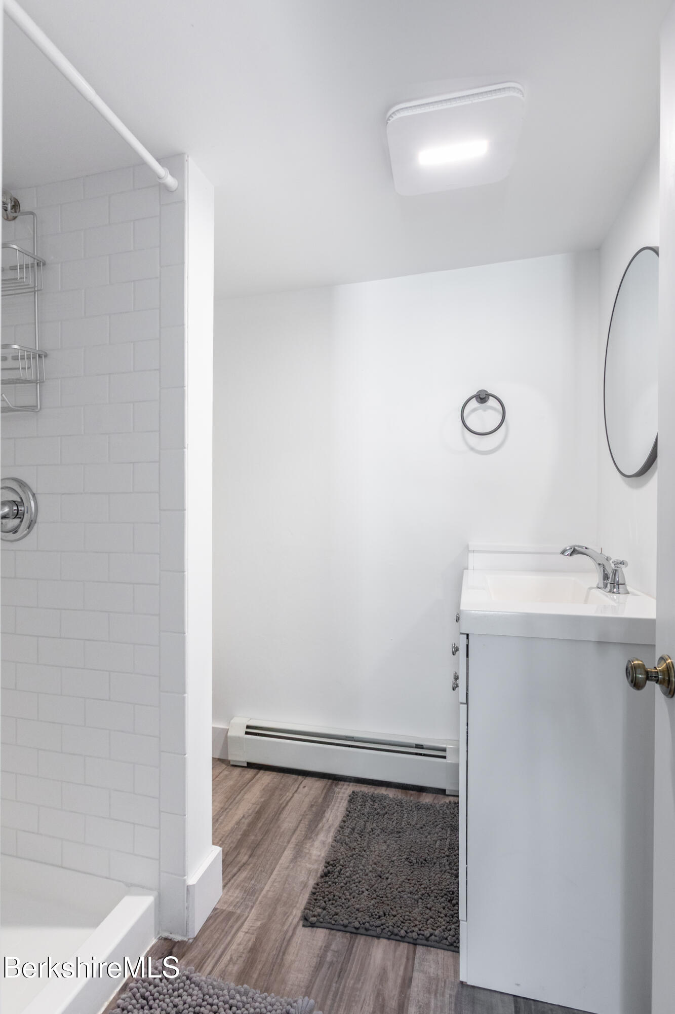 35 Chapman Road Pittsfield, MA 01201 - Photo 22 of 43 a bathroom with a sink a toilet and a shower