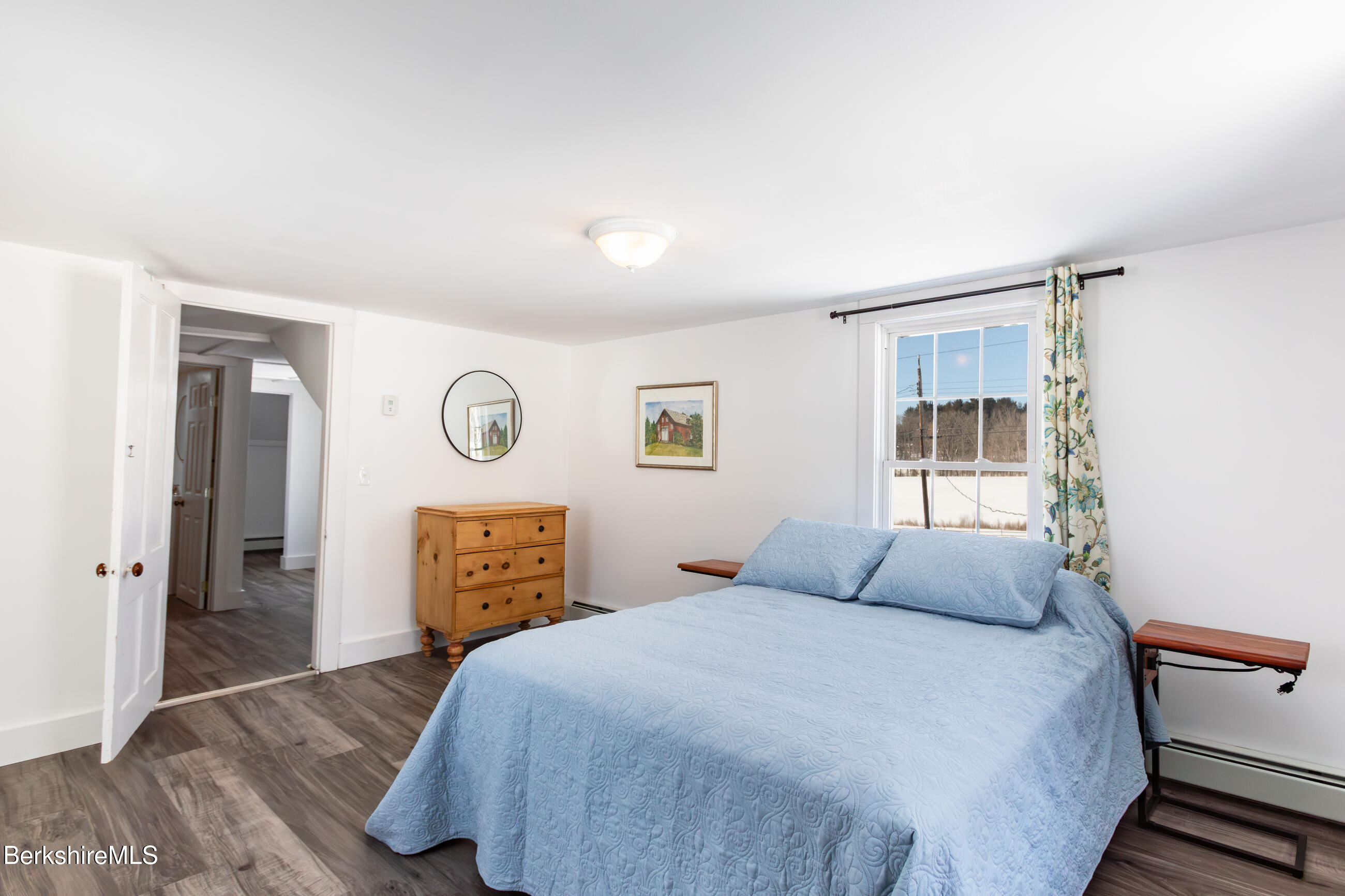 35 Chapman Road Pittsfield, MA 01201 - Photo 24 of 43 a bedroom with a bed and a window