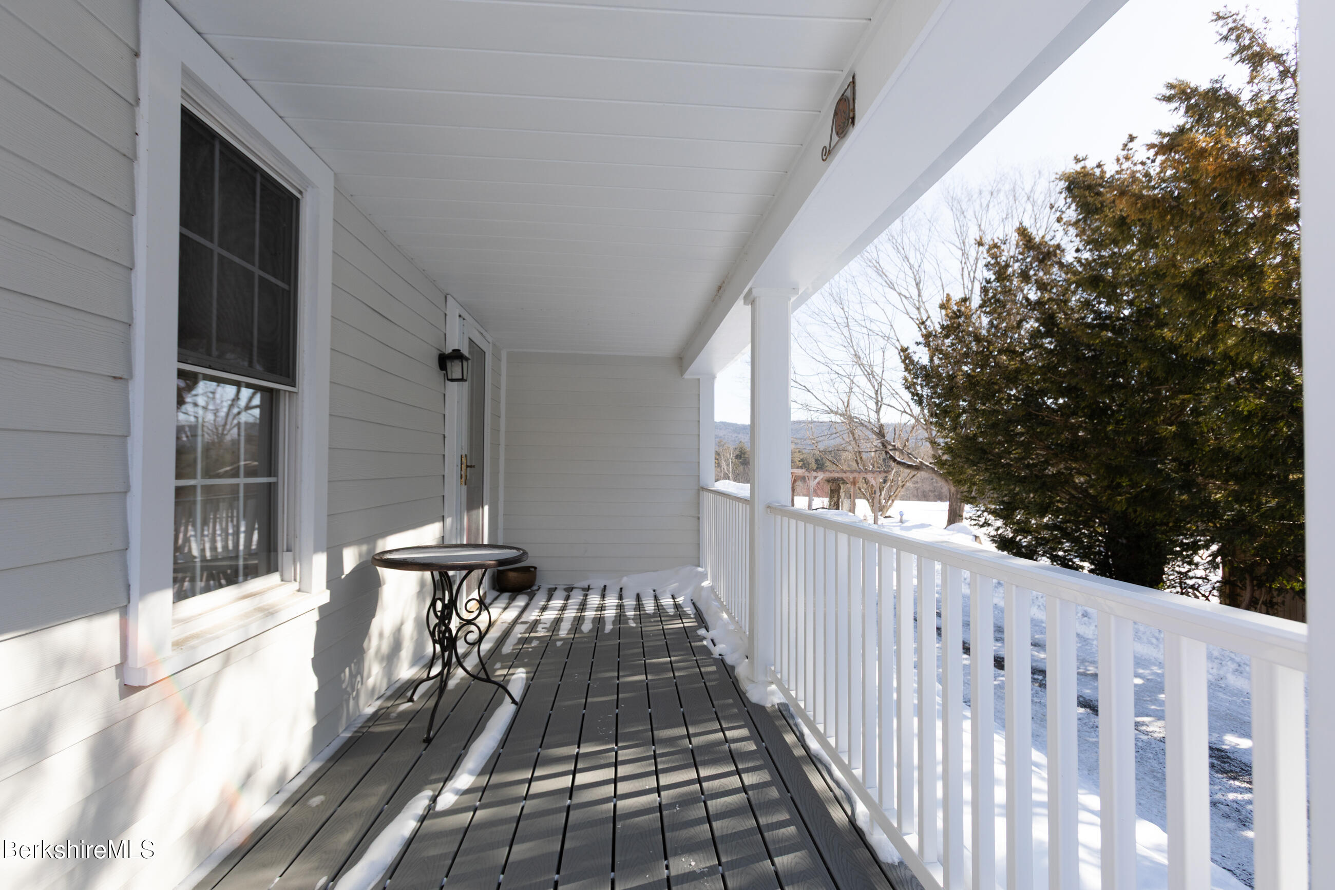 35 Chapman Road Pittsfield, MA 01201 - Photo 3 of 43 a view of a balcony with wooden floor
