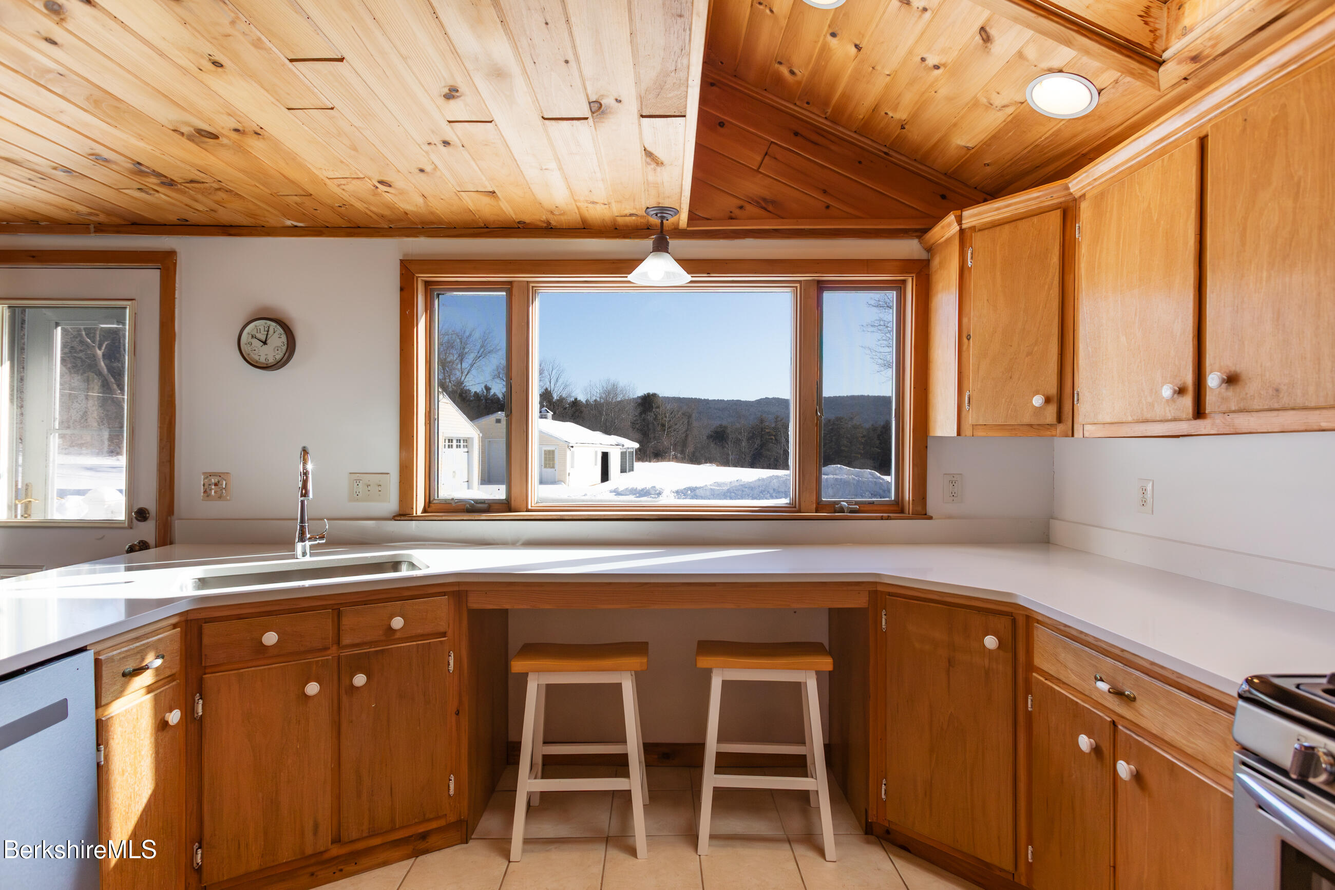 35 Chapman Road Pittsfield, MA 01201 - Photo 4 of 43 a kitchen with a sink and cabinets