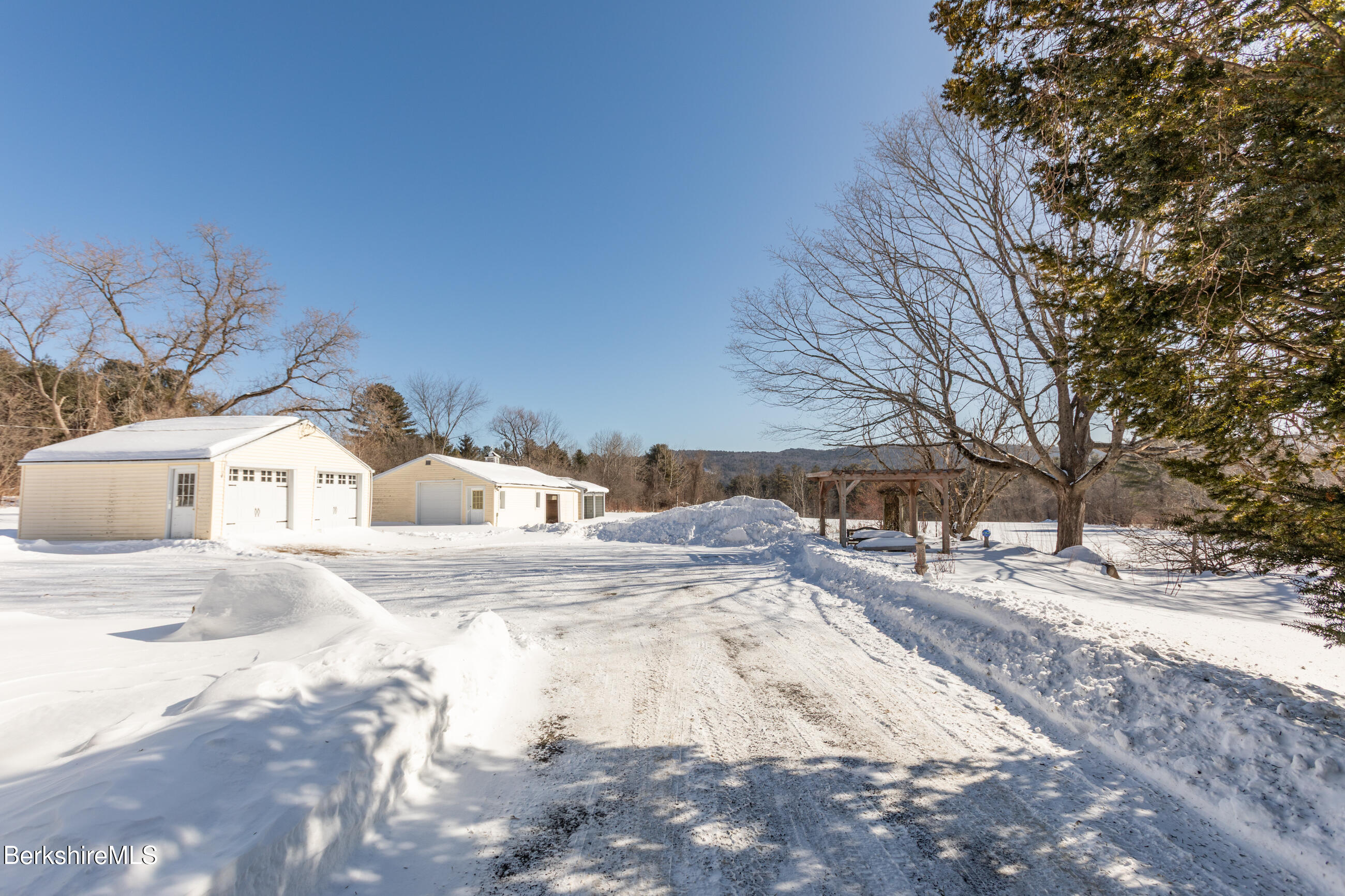 35 Chapman Road Pittsfield, MA 01201 - Photo 42 of 43 a view of a house with snow on the road