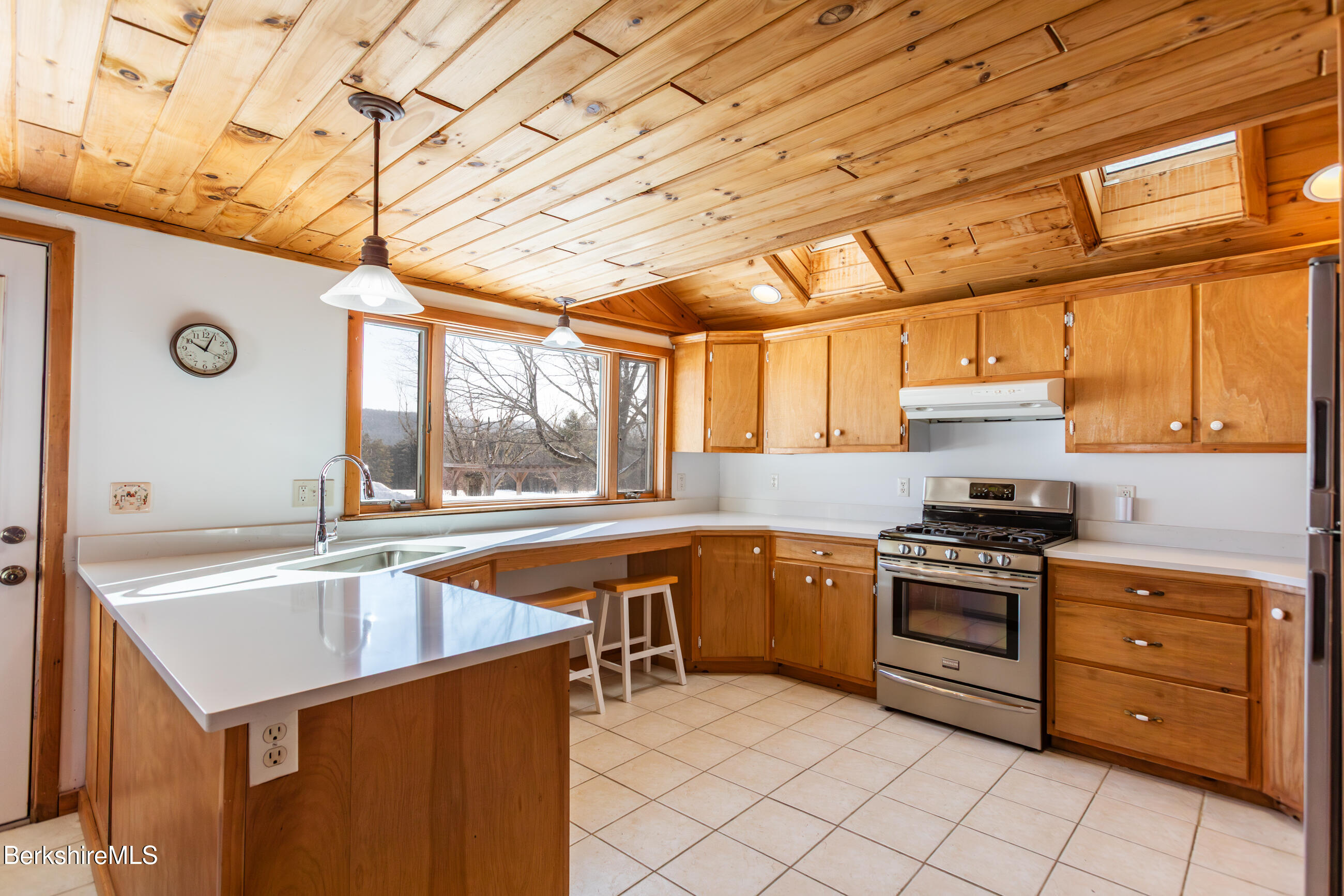 35 Chapman Road Pittsfield, MA 01201 - Photo 5 of 43 a kitchen that has a sink and a stove