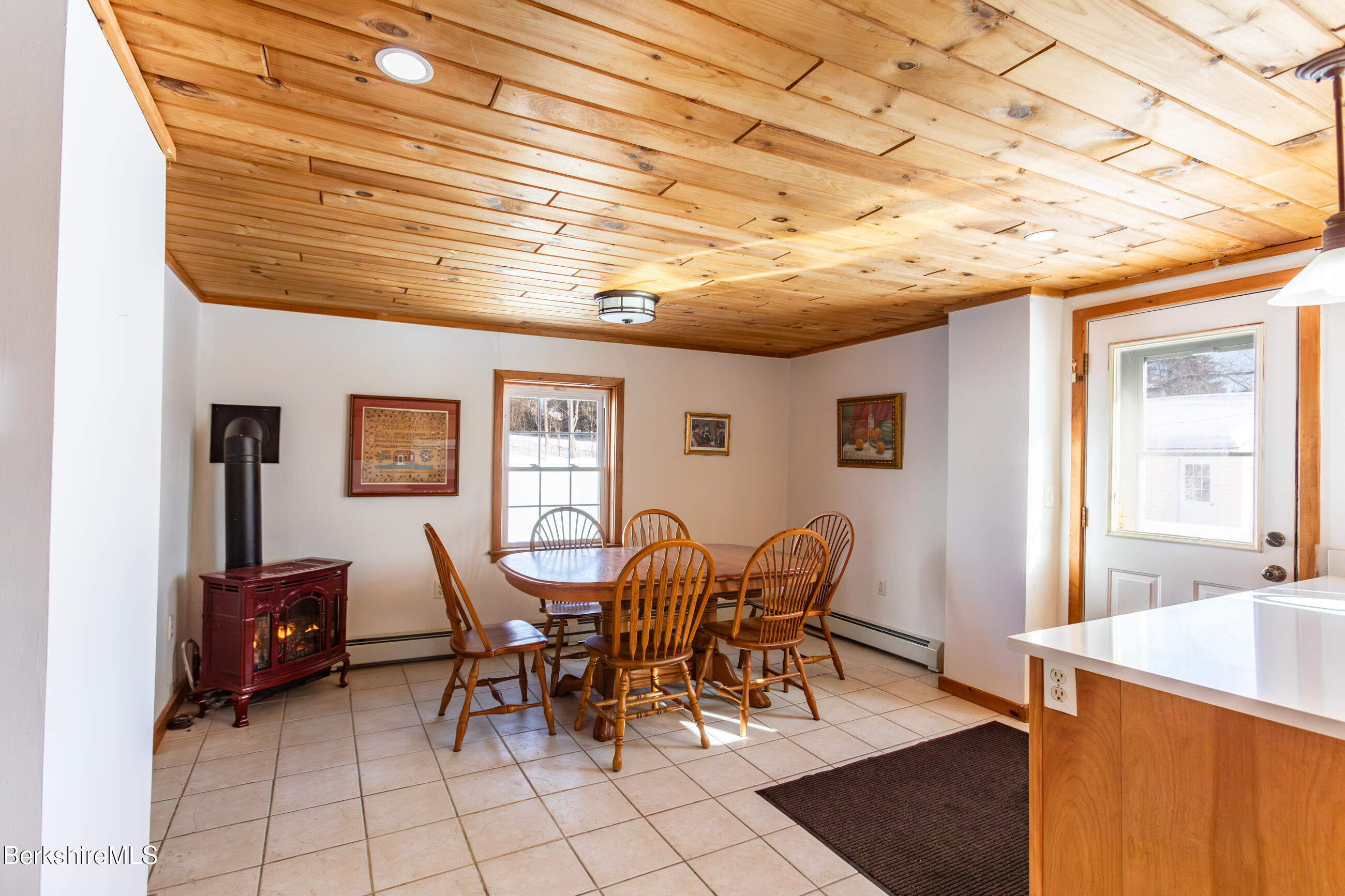 35 Chapman Road Pittsfield, MA 01201 - Photo 7 of 43 a view of a dining room with furniture and chandelier