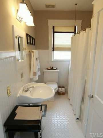 308 Pace Street Raleigh, NC 27604 - Photo 17 of 25 Original hall bath has been updated.