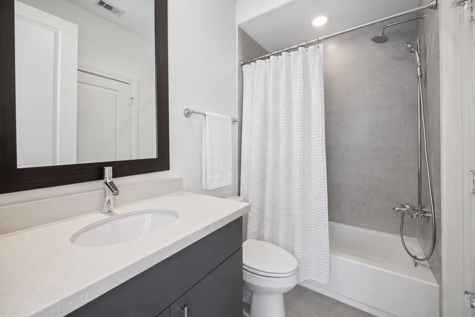 2714 Harvard Street Houston, TX 77008 - Photo 7 of 31 a bathroom with a sink toilet and shower