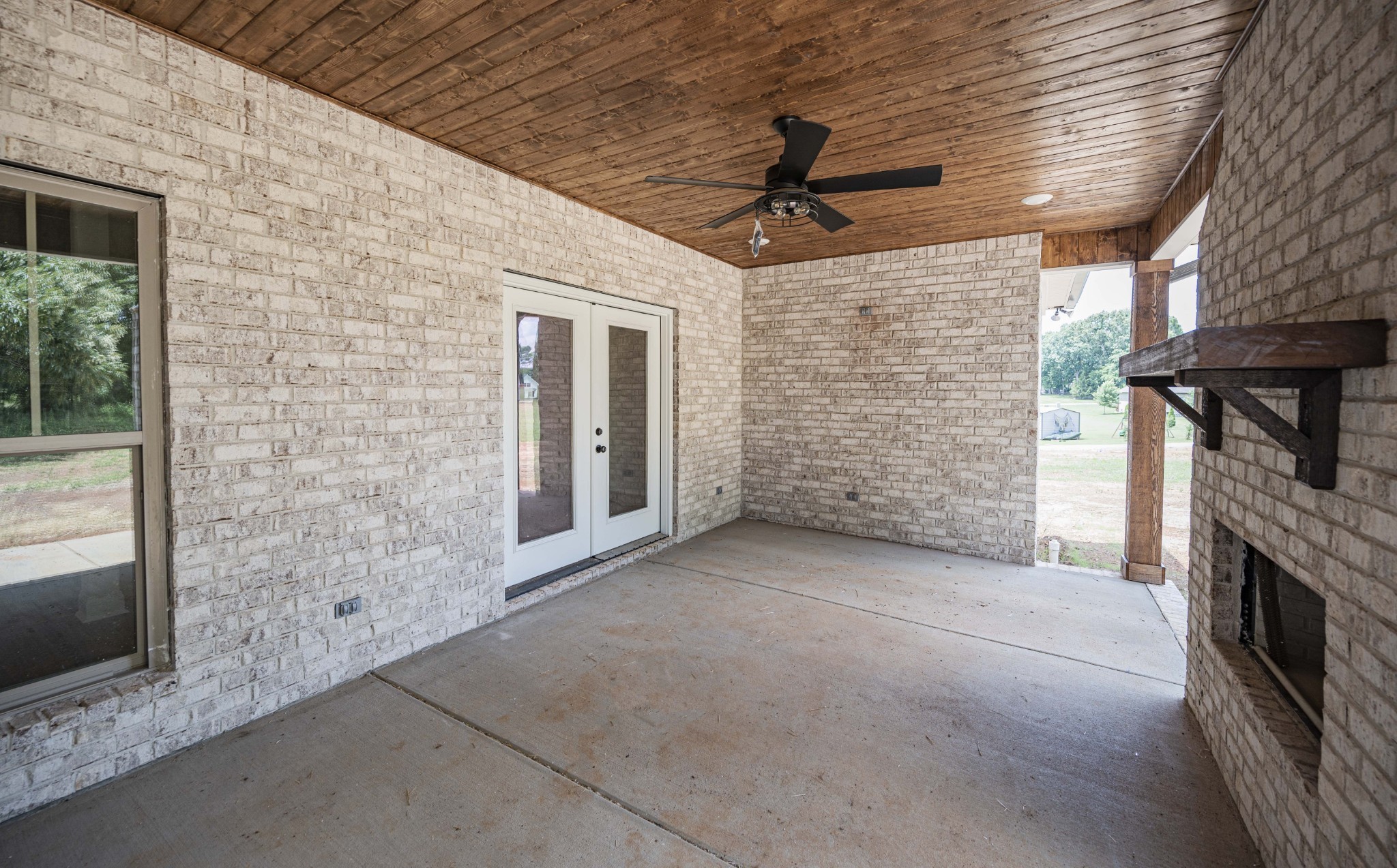 7502 Midland Road Christiana, TN 37037 - Photo 13 of 63 a view of a livingroom with an empty space and a fireplace