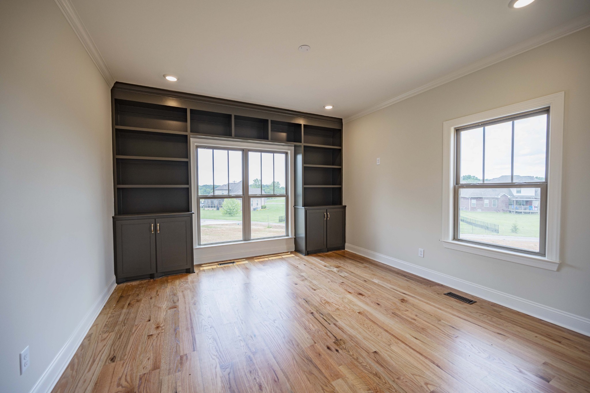 7502 Midland Road Christiana, TN 37037 - Photo 41 of 63 a view of an empty room with a window and wooden floor