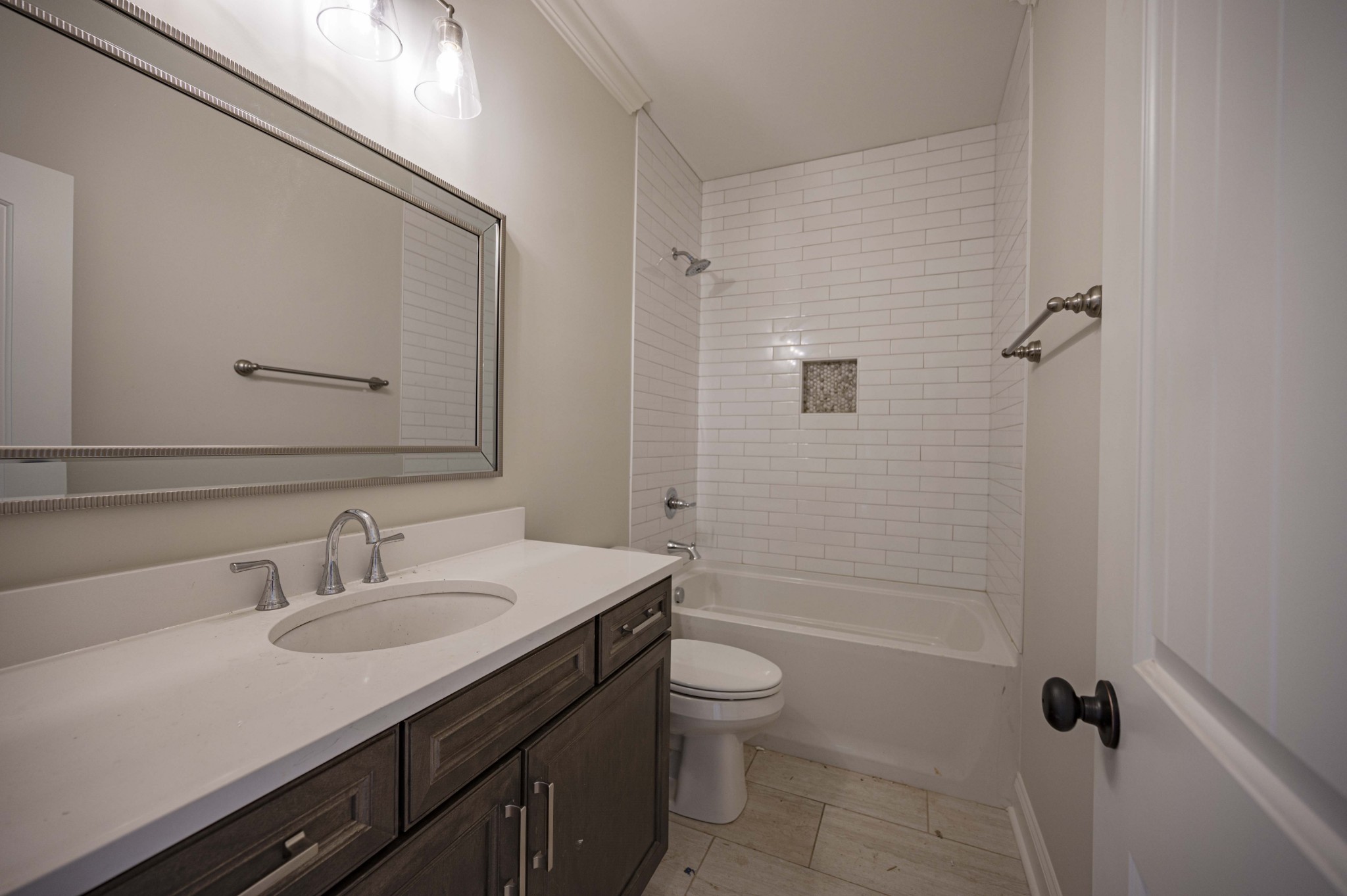 7502 Midland Road Christiana, TN 37037 - Photo 42 of 63 a bathroom with a sink toilet tub and shower