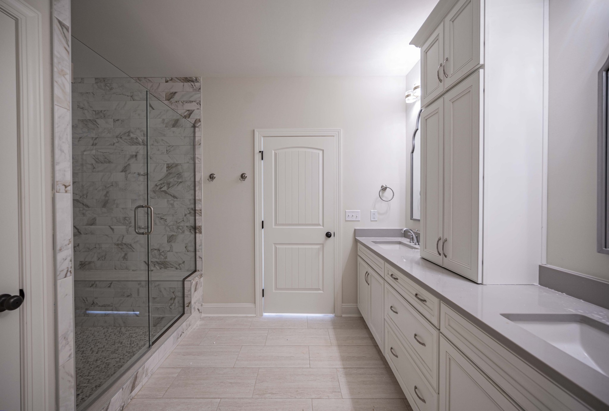 7502 Midland Road Christiana, TN 37037 - Photo 48 of 63 a bathroom with a granite countertop double vanity sink a mirror and a shower