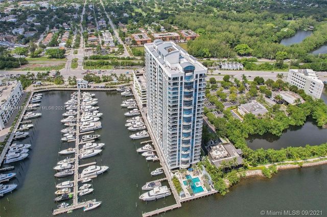 a picture of a bench in front of a building