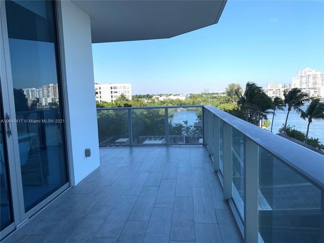 a room with a bed and a window