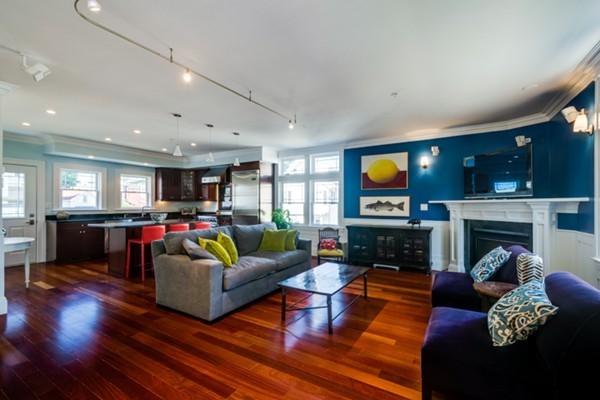 100 Vernon Street, Unit 6 Somerville, MA 02145 - Photo 3 of 10 a living room with furniture fireplace and flat screen tv