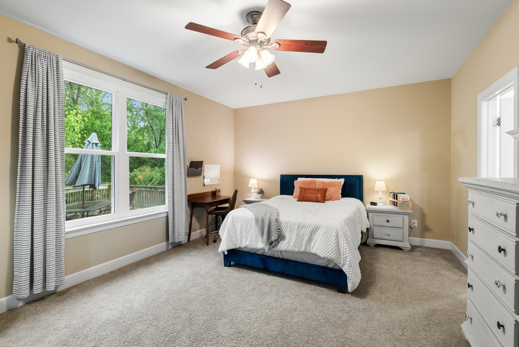 2014 Morton Drive Spring Hill, TN 37174 - Photo 19 of 44 a bedroom with a bed chandelier and a large window
